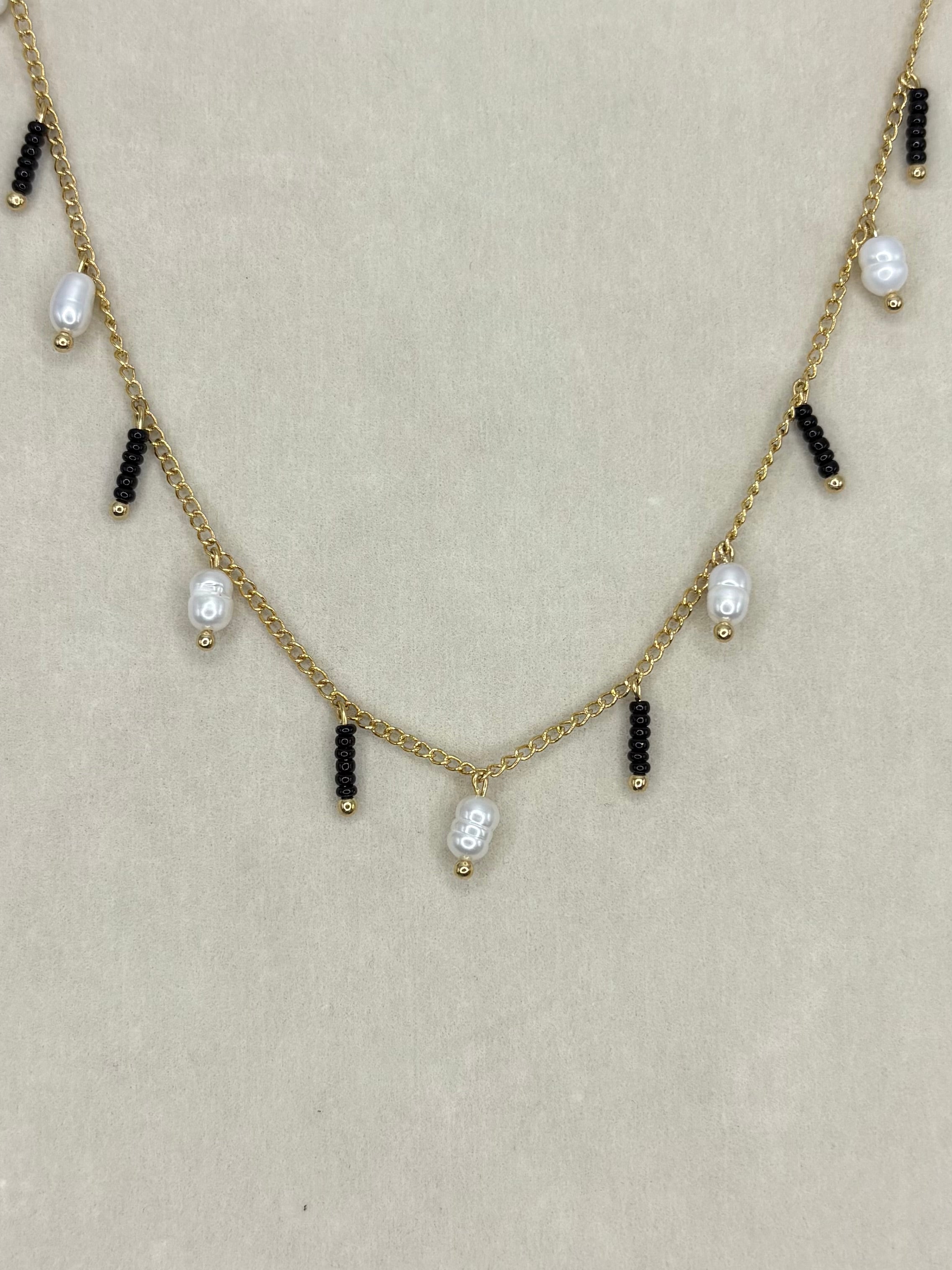 Collar de perlas colgantes