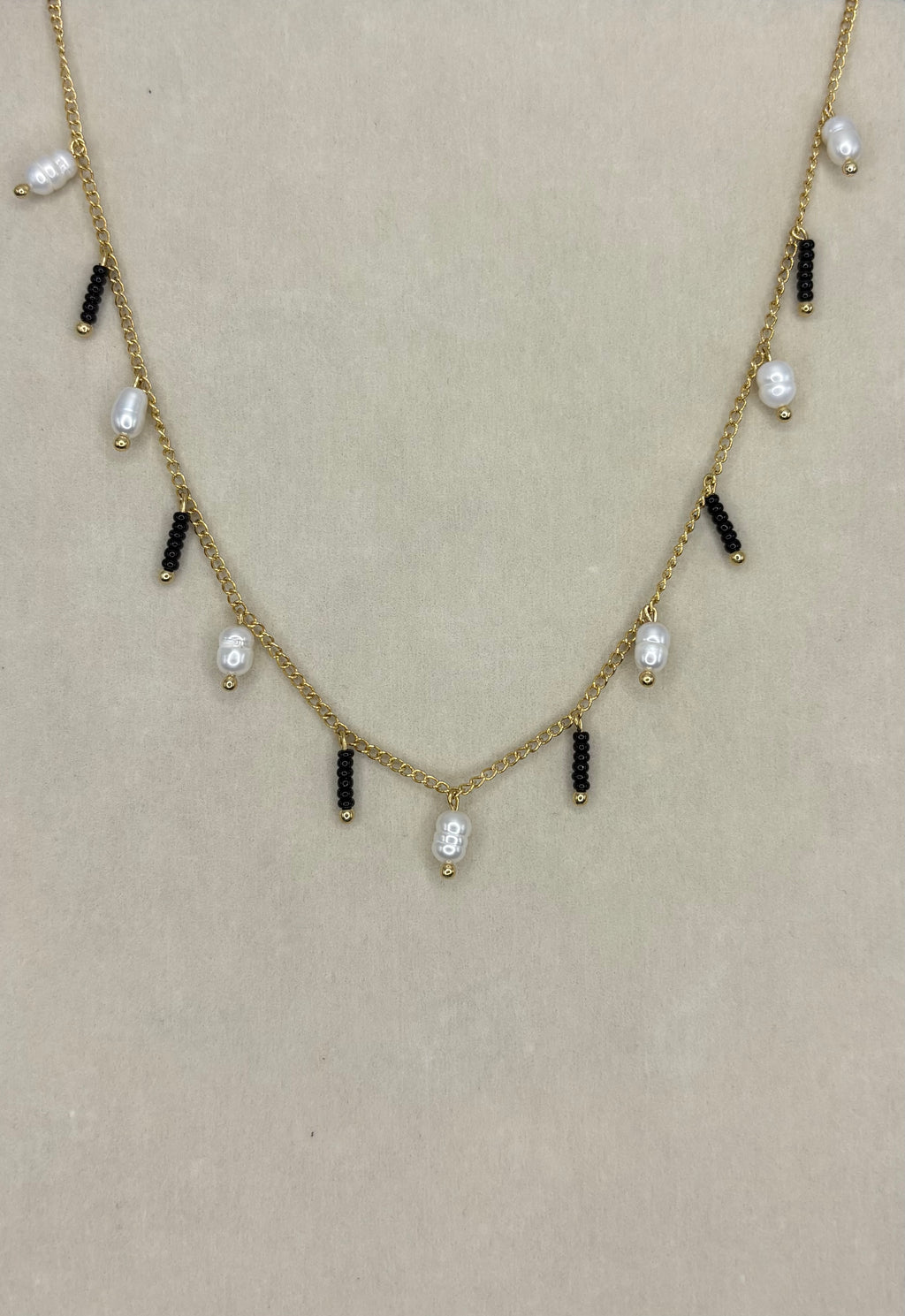 Collar de perlas colgantes