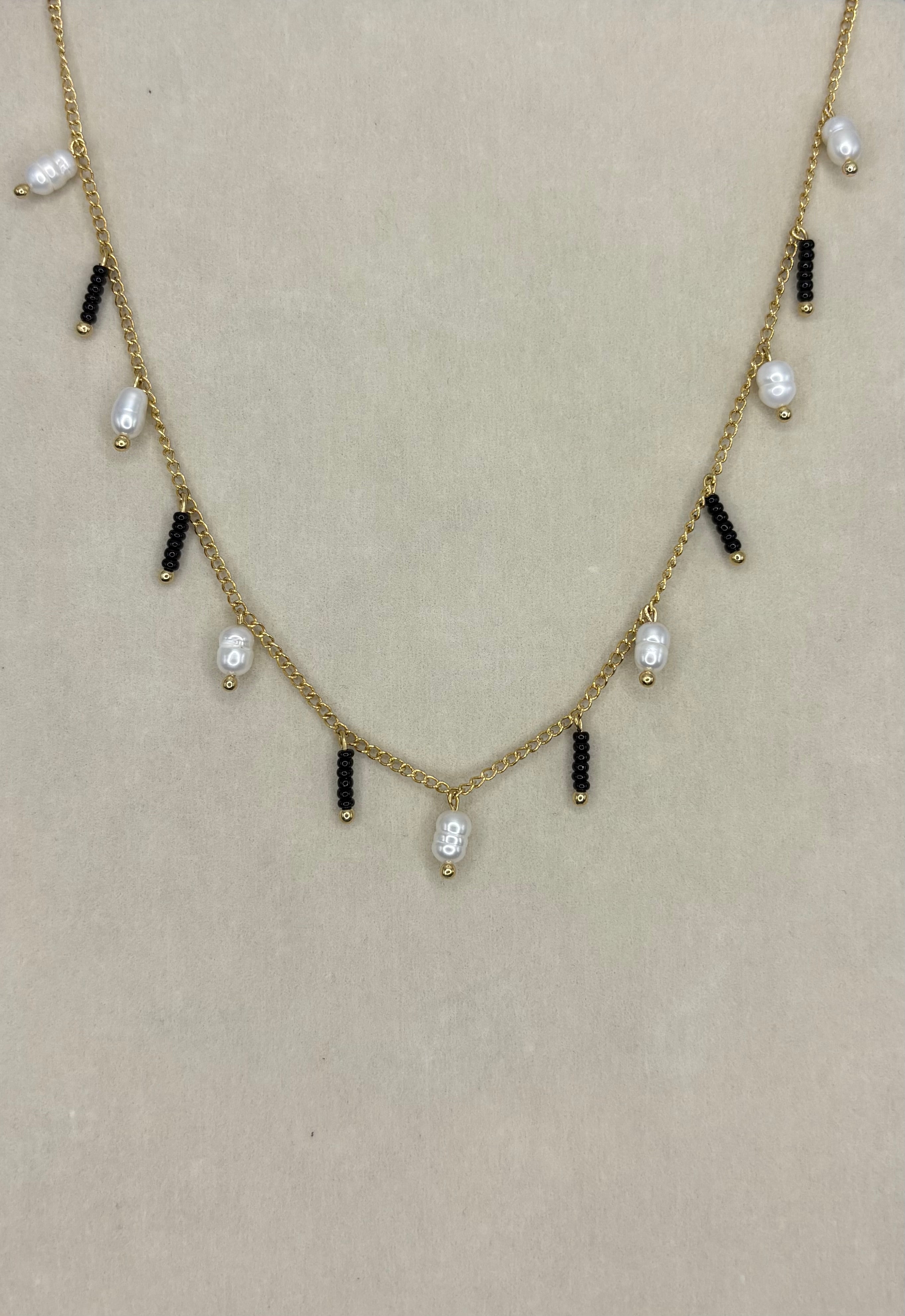 Collar de perlas colgantes